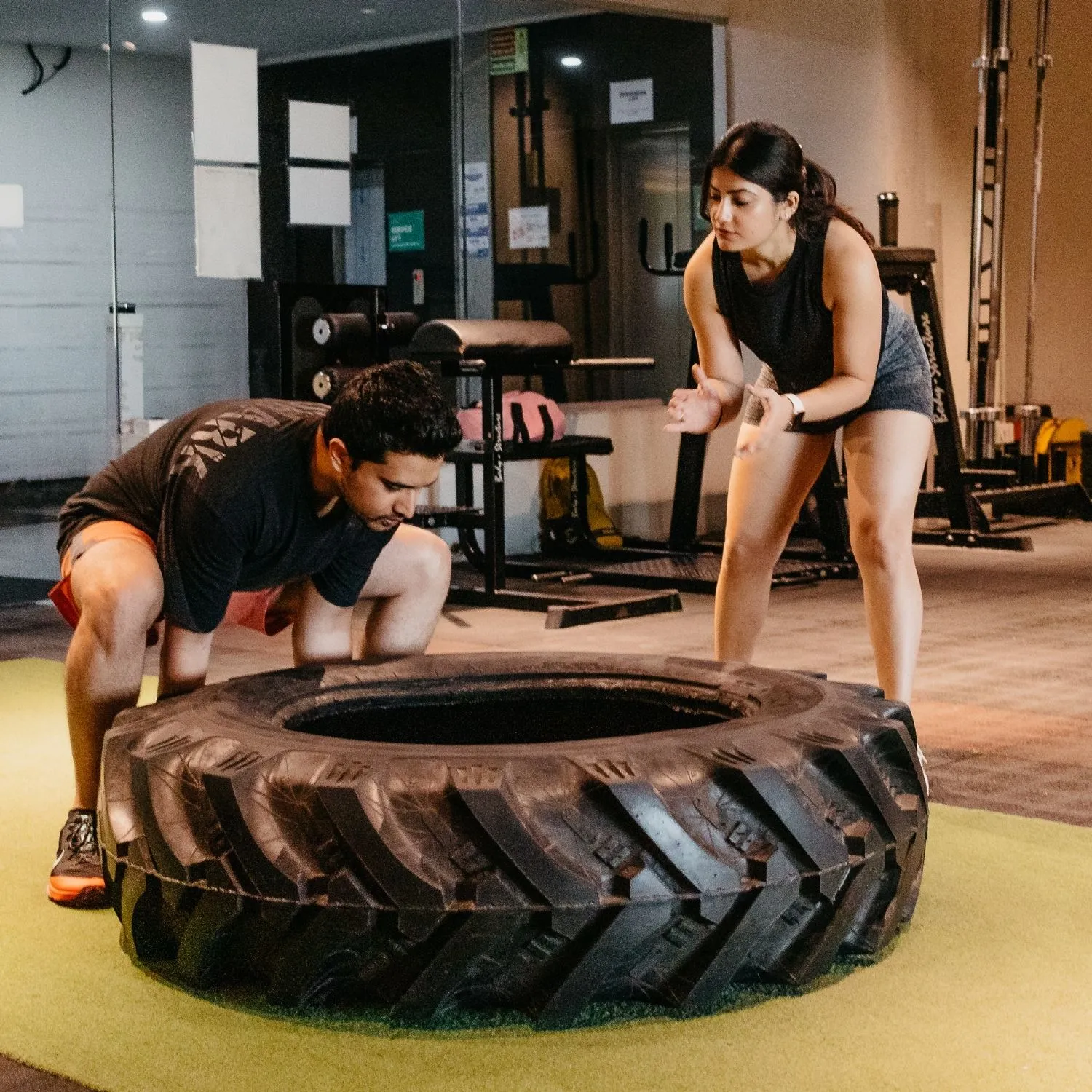 Coaching a tire flip